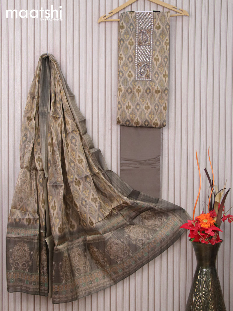 Tissue dress material beige grey and grey with allover ikat prints & mirror beaded work neck pattern and bottom & dupatta