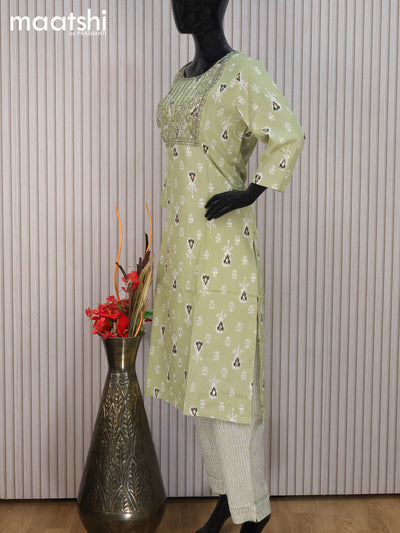 Rayon readymade salwar suit pastel green with ikat butta prints & embroidery sequin work neck pattern and straight cut pant