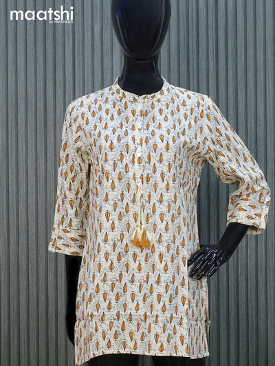 Cotton readymade short kurti cream with allover butta prints & mirror work without pant