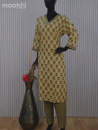 Cotton readymade salwar suit mustard shade with allover floral butta prints & v neck pattern and stright cut pant & dupatta