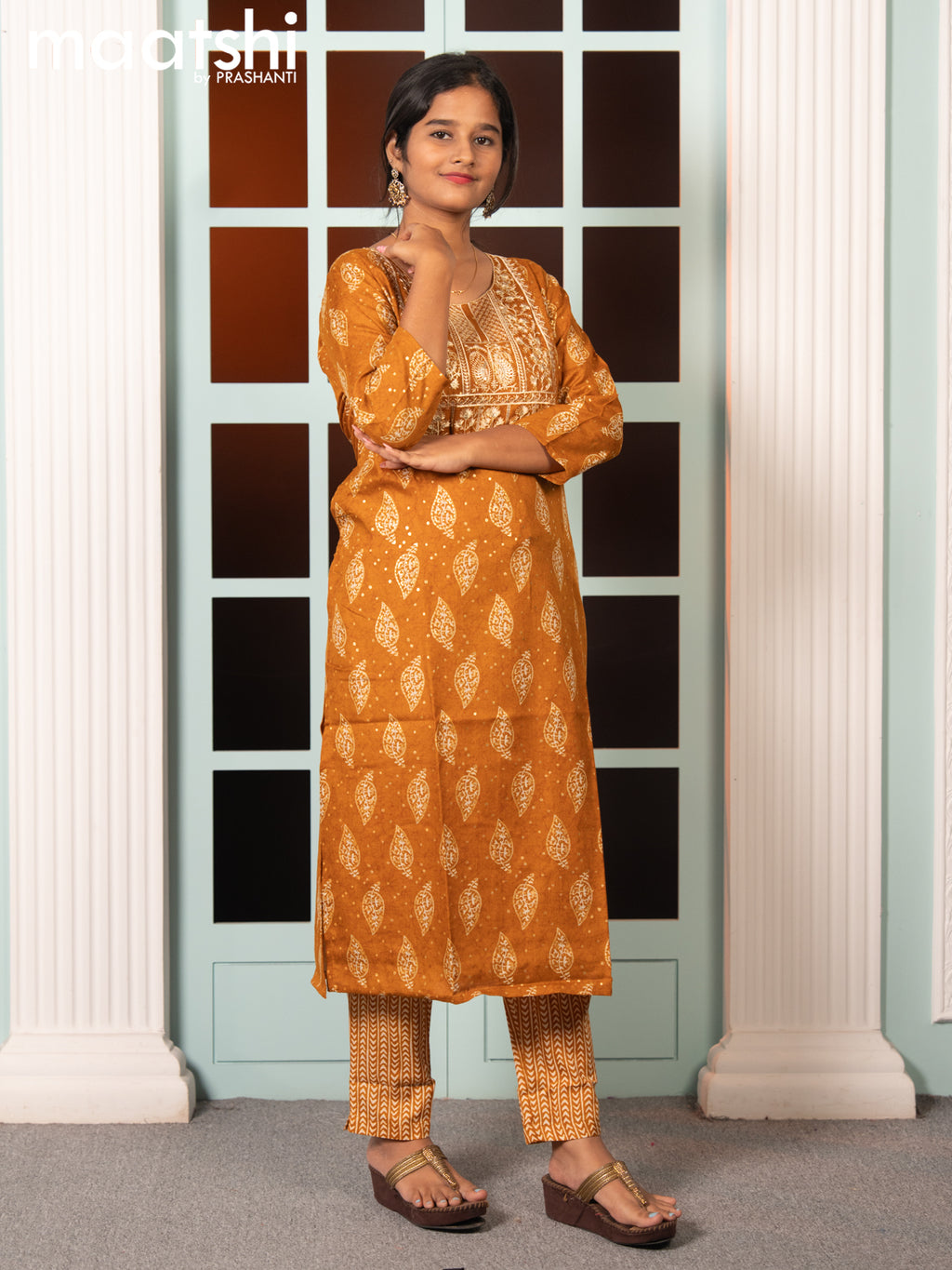 Rayon readymade salwar suit dark mustard with allover butta prints & embroidery sequin work neck pattern and straight cut pant