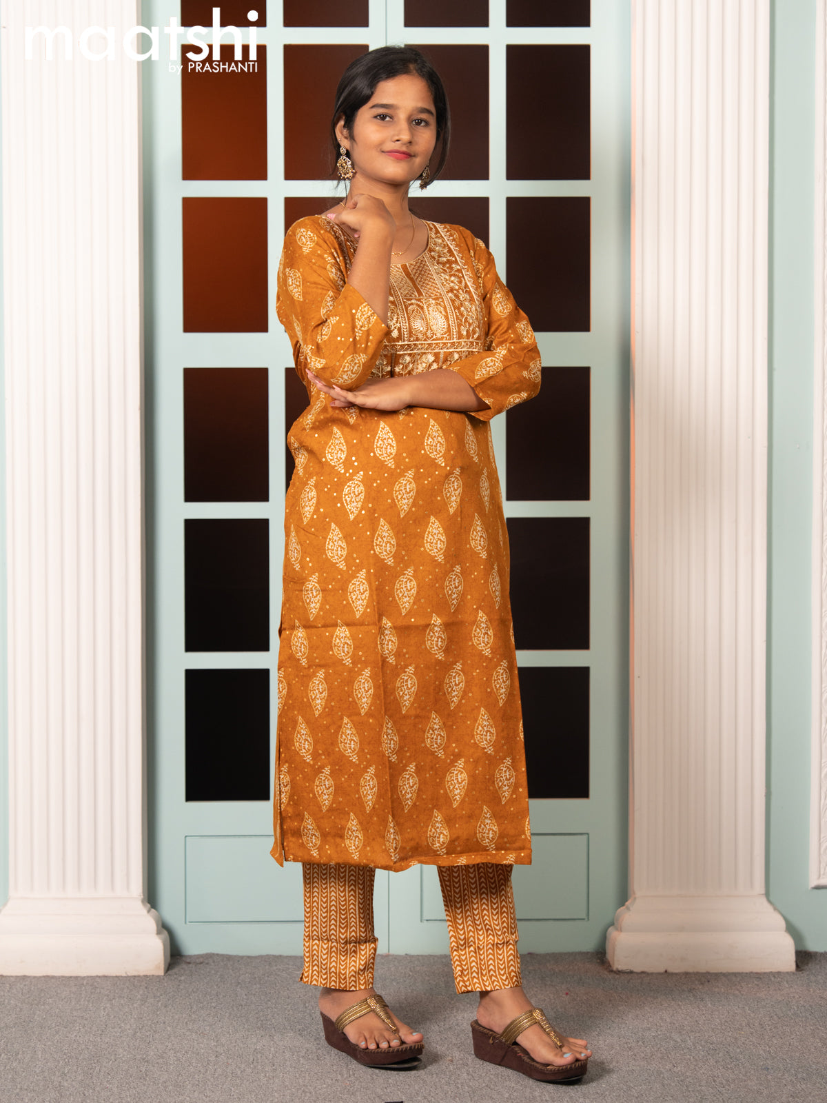 Rayon readymade salwar suit dark mustard with allover butta prints & embroidery sequin work neck pattern and straight cut pant