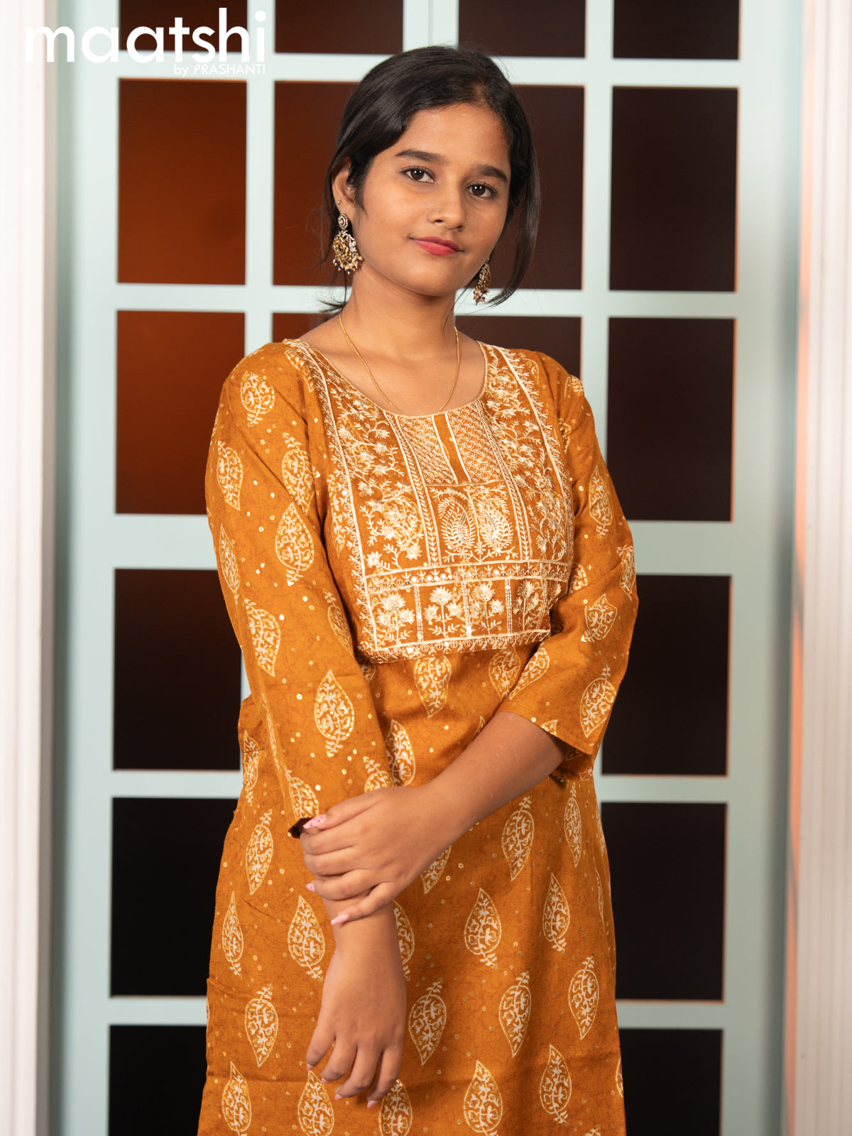 Rayon readymade salwar suit dark mustard with allover butta prints & embroidery sequin work neck pattern and straight cut pant