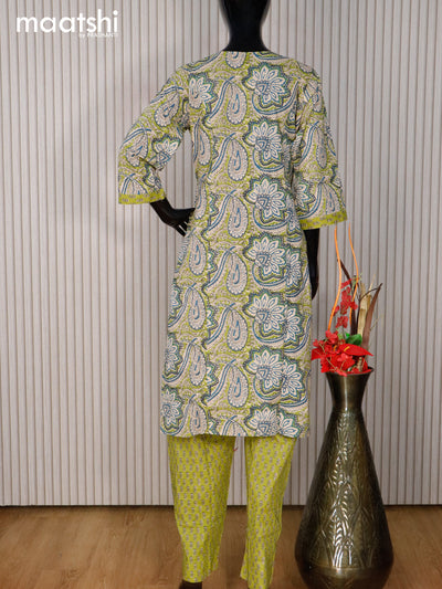 Cotton readymade kurti set green shade with allover prints & v neck pattern and straight cut pant