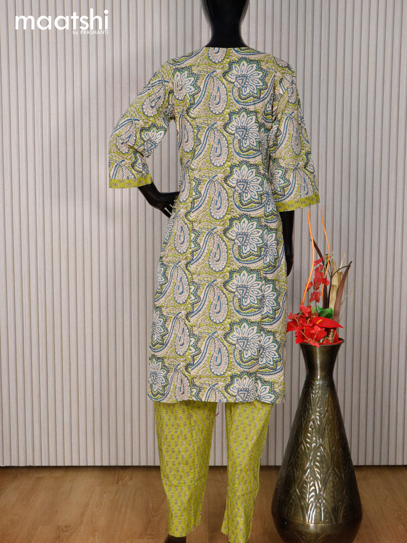 Cotton readymade kurti set green shade with allover prints & v neck pattern and straight cut pant