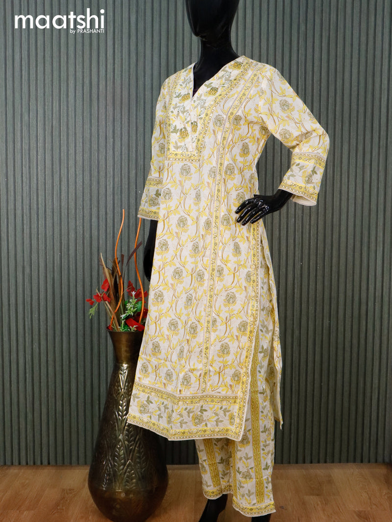 Cotton readymade salwar suit cream and yellow with allover floral prints & v neck pattern and straight cut pant & dupatta