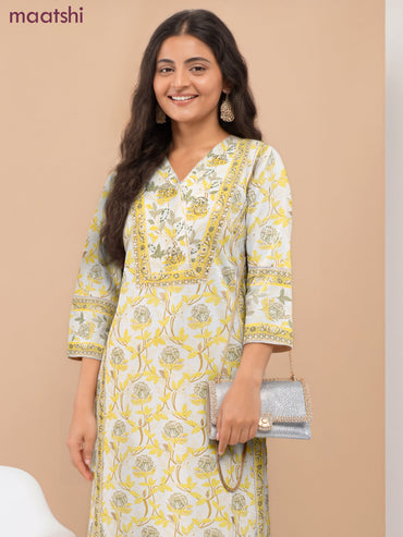 Cotton readymade salwar suit cream and yellow with allover floral prints & v neck pattern and straight cut pant & dupatta
