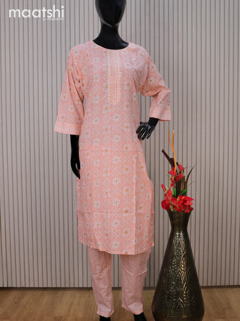 Cotton readymade kurti set peach shade and off white with allover prints & embroidery work neck pattern and straight cut pant