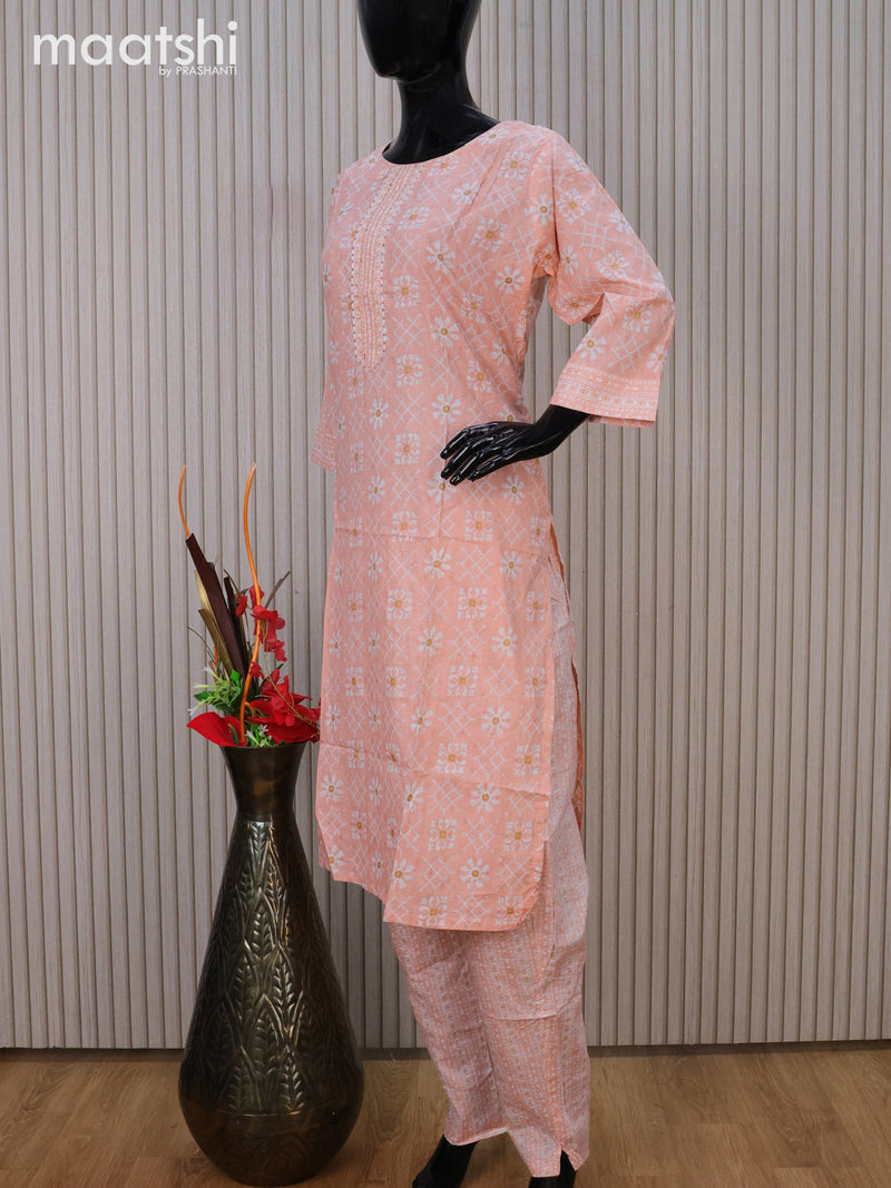 Cotton readymade kurti set peach shade and off white with allover prints & embroidery work neck pattern and straight cut pant
