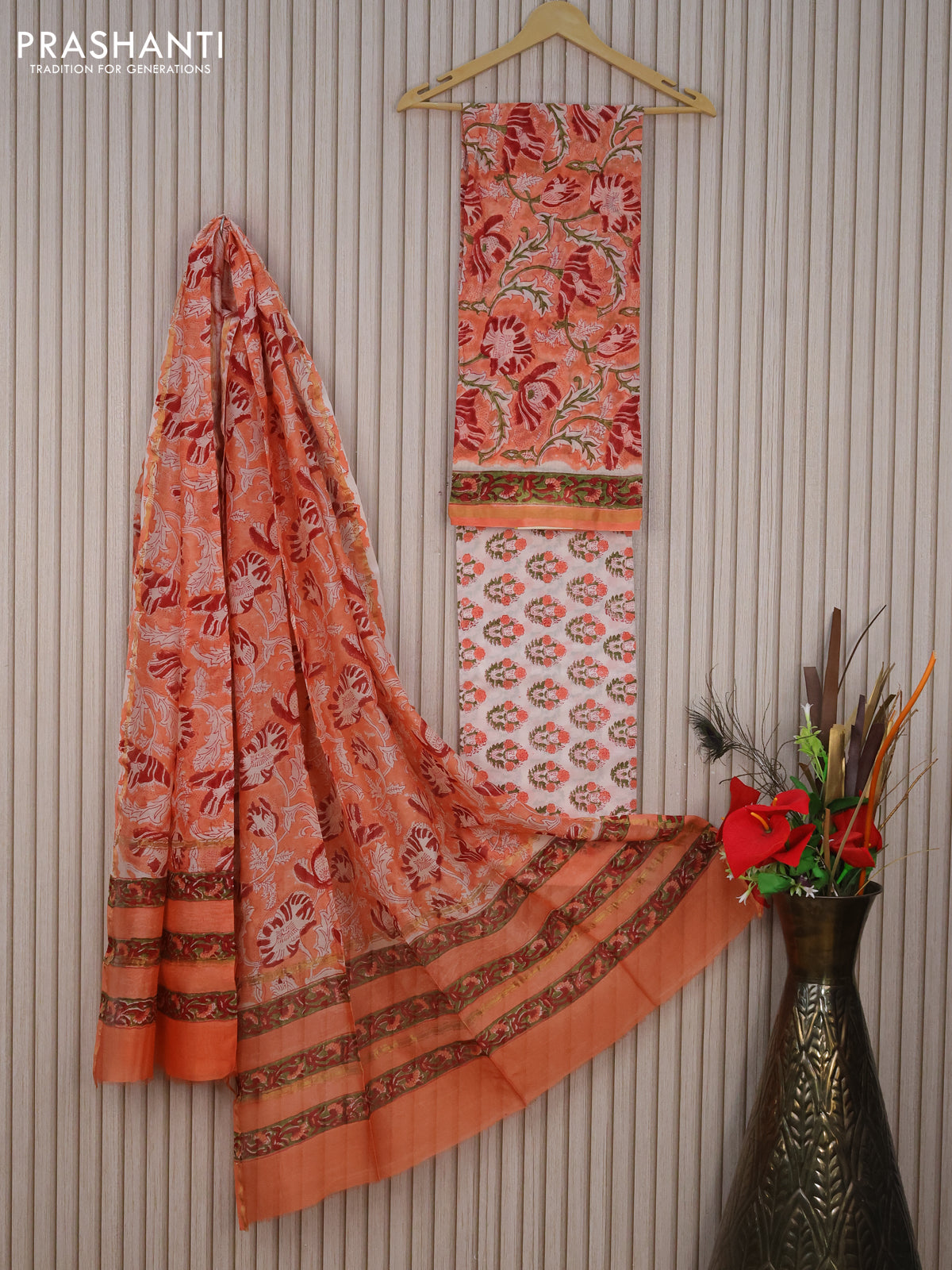 Pure chanderi dress material peach orange and off white with allover kalamkari prints and small zari woven border