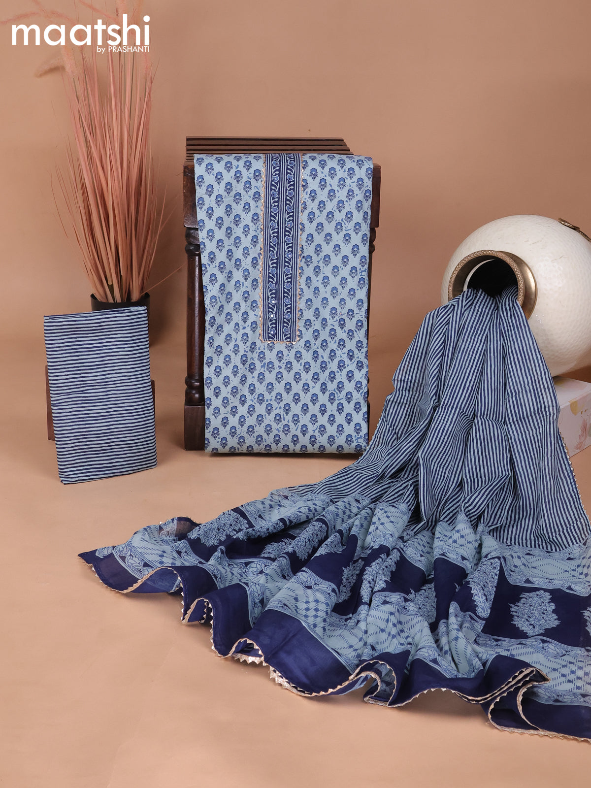 Cotton dress material pastel blue and blue with floral butta prints & patch work neck pattern and bottom & gottapatti lace work dupatta