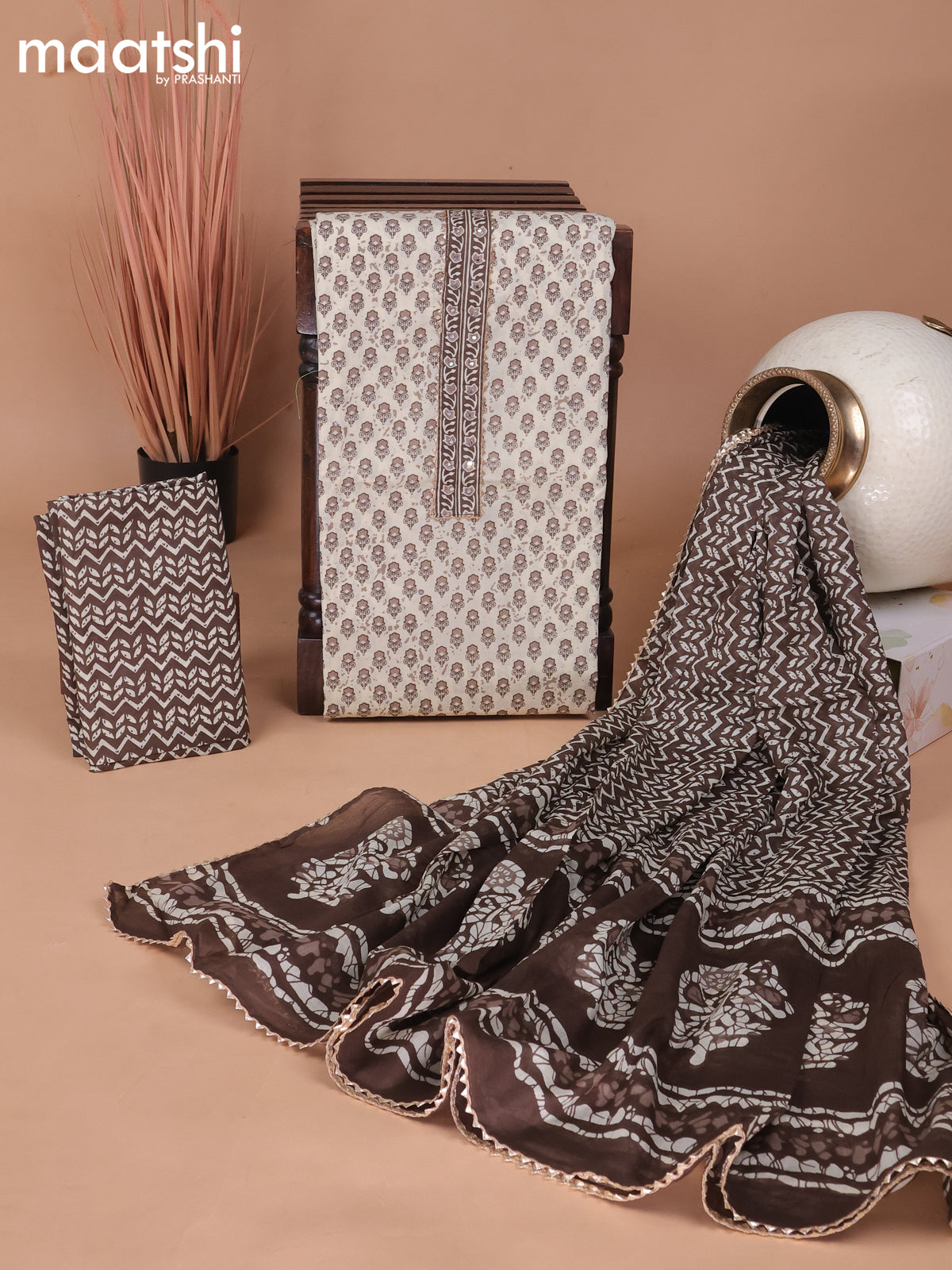 Cotton dress material cream and brown with floral butta prints & patch work neck pattern and bottom & gottapatti lace work dupatta