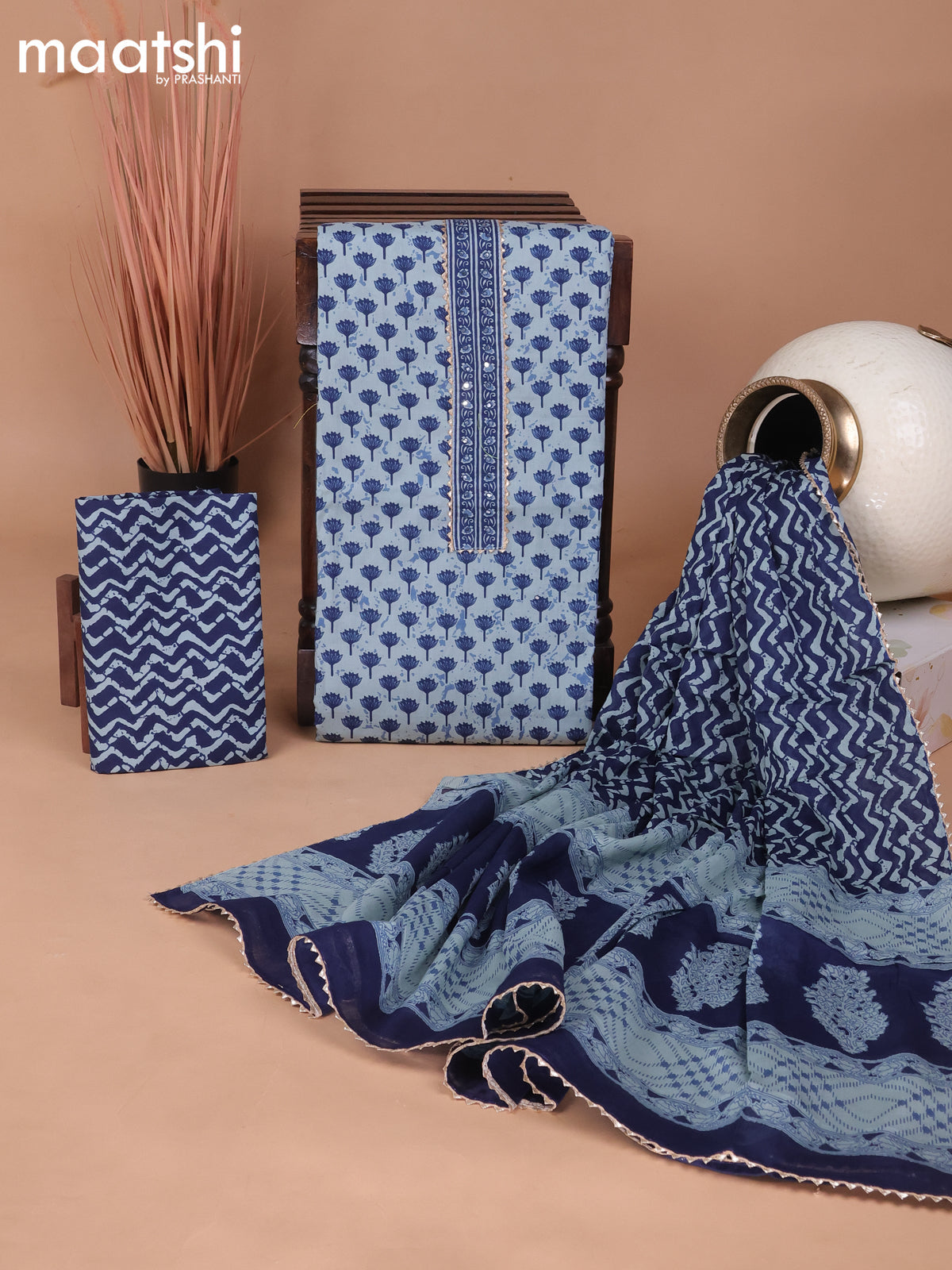 Cotton dress material pastel blue and blue with floral butta prints & patch work neck pattern and bottom & gottapatti lace work dupatta