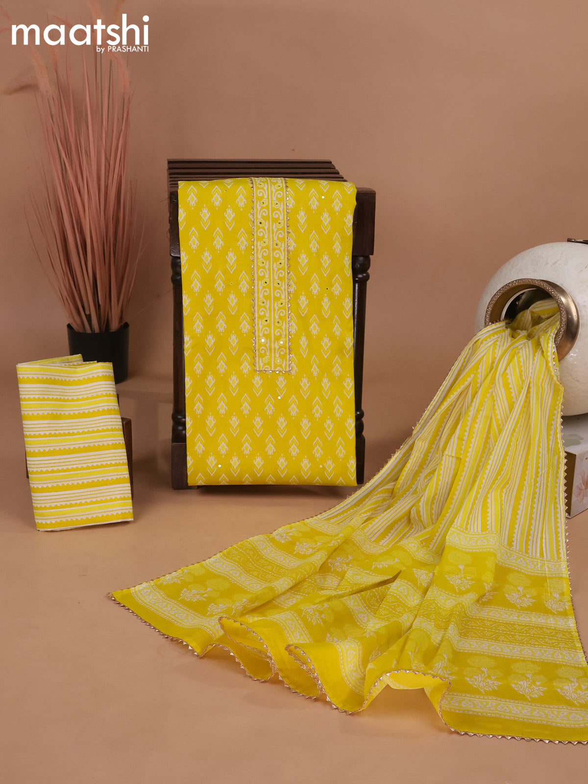 Cotton dress material yellow with ikat butta prints & patch work neck pattern and bottom & gottapatti lace work dupatta