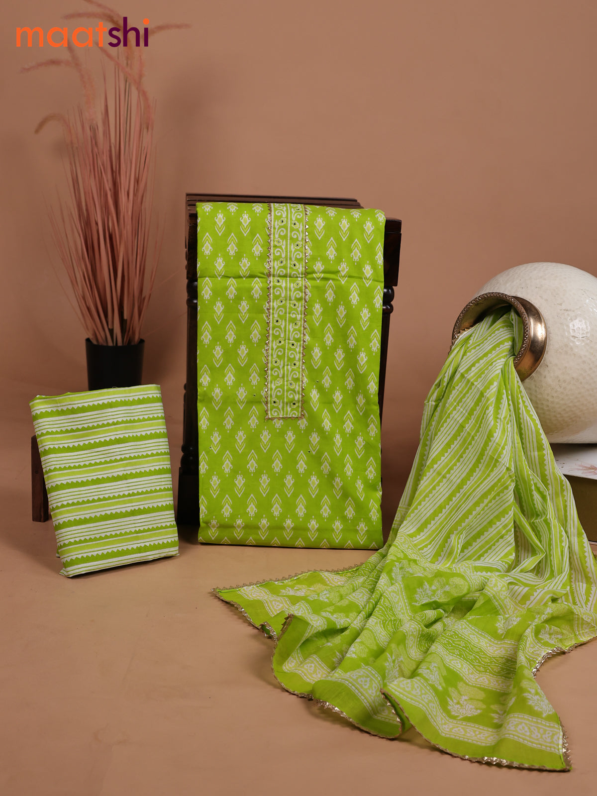 Cotton dress material fluorescent green with ikat butta prints & patch work neck pattern and bottom & gottapatti lace work dupatta