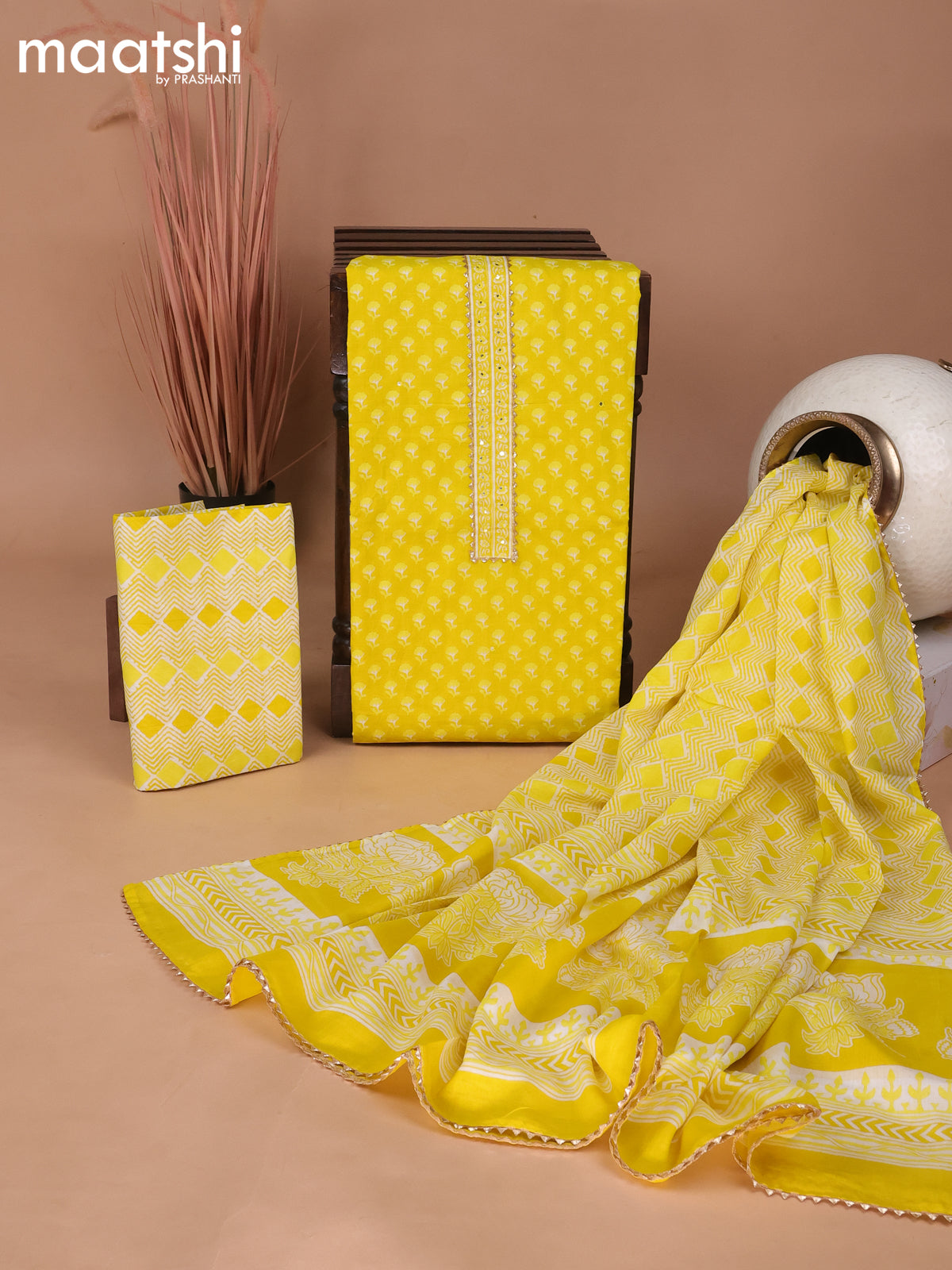 Cotton dress material yellow with allover butta prints & patch work neck pattern and bottom & gottapatti lace work dupatta