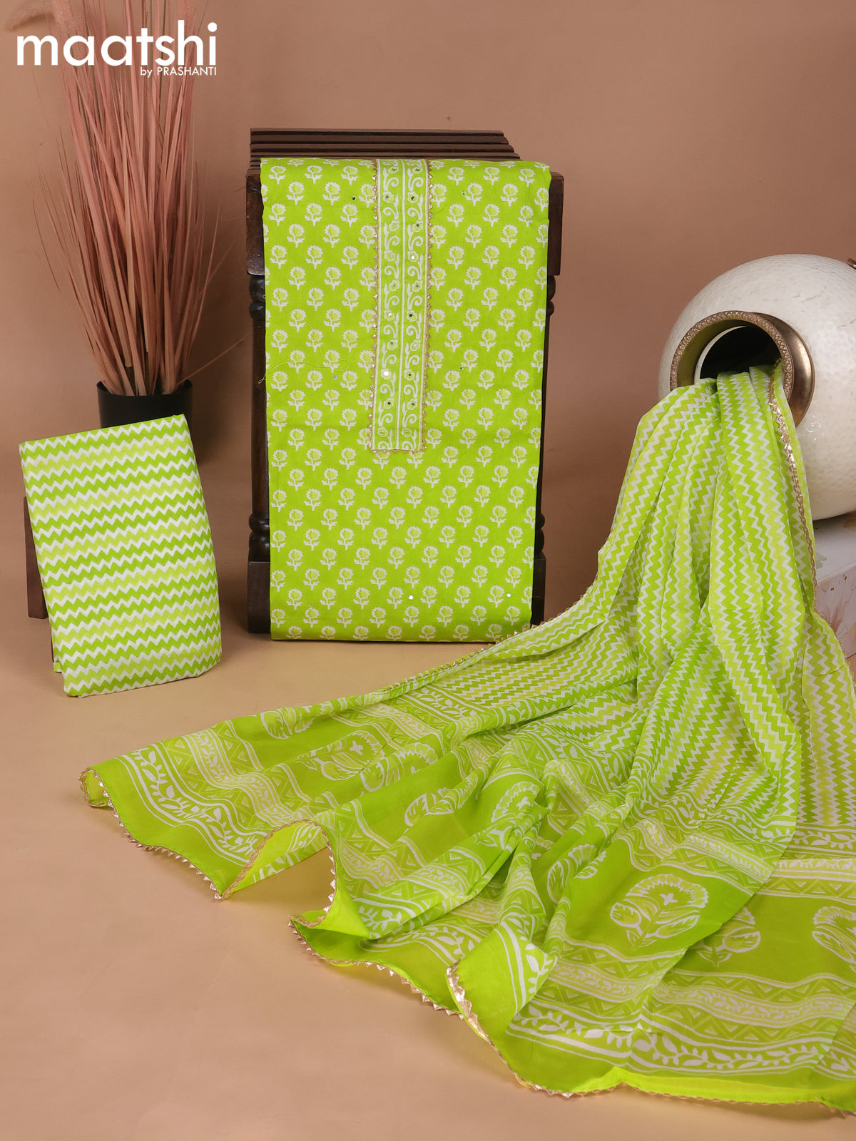 Cotton dress material fluorescent green with butta prints & patch work neck pattern and bottom & gottapatti lace work dupatta