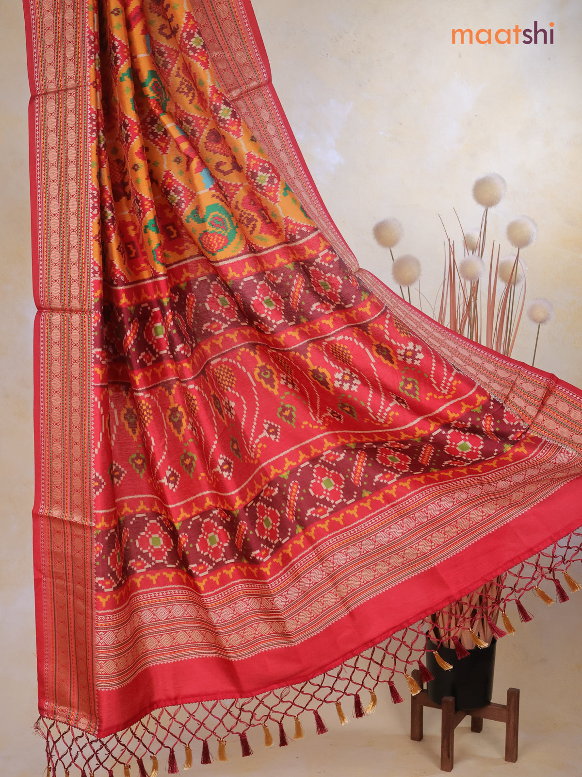 Tussar Ikat dupattas mango yellow and kumkum red with allover patola prints and thread woven border