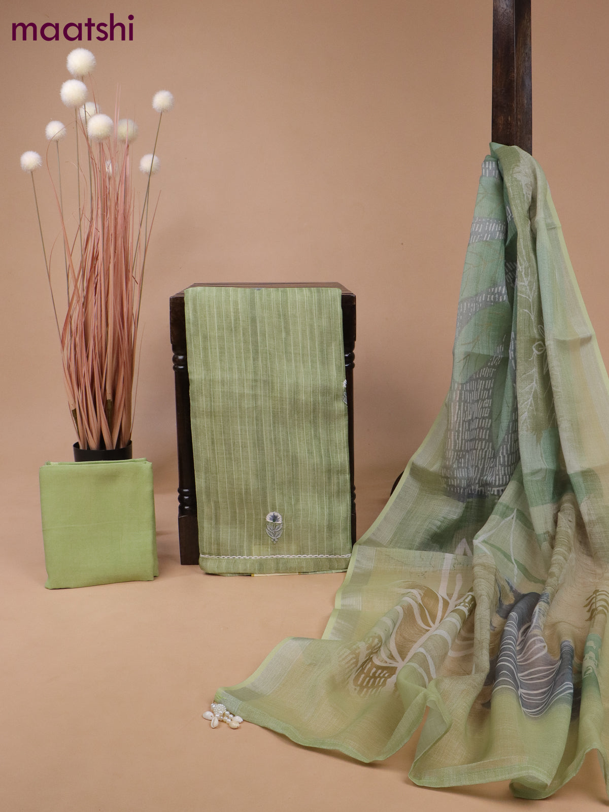 Tissue linen dress material pastel green with floral design embroidery work buttas and bottom & printed dupatta