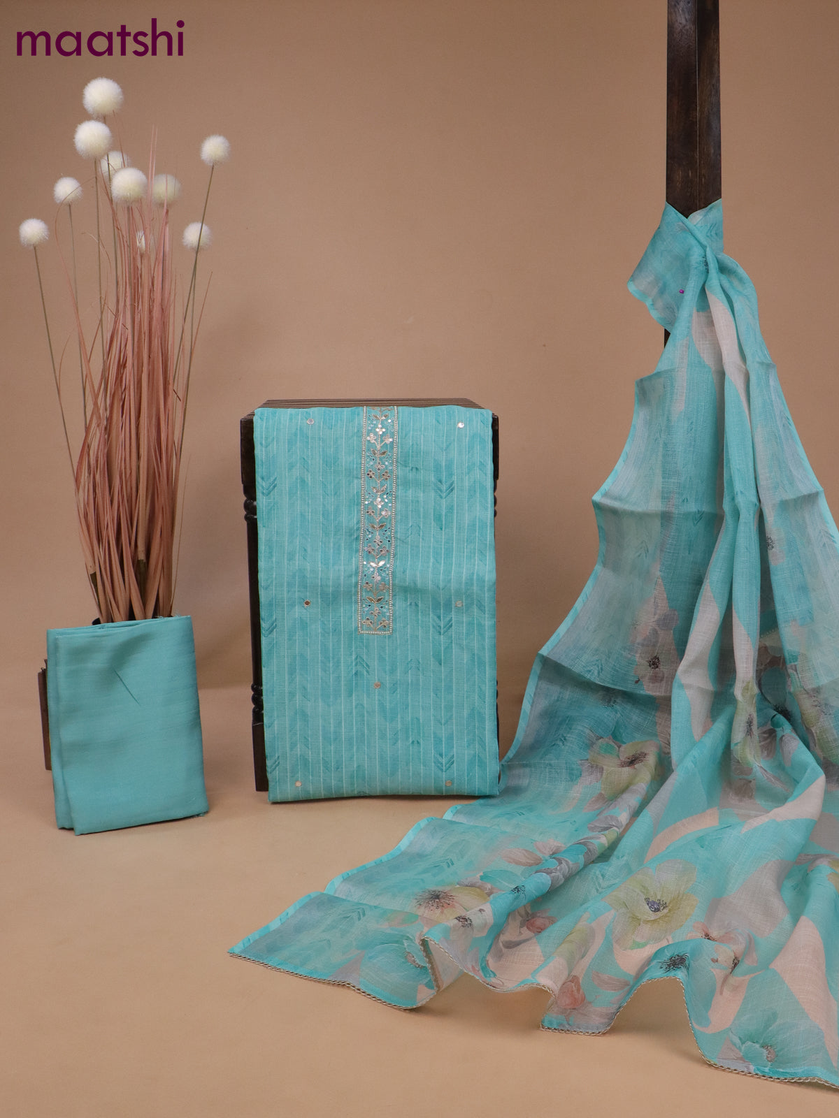 Tissue linen dress material teal blue with allover prints & mirror beaded work neck pattern and bottom & printed dupatta