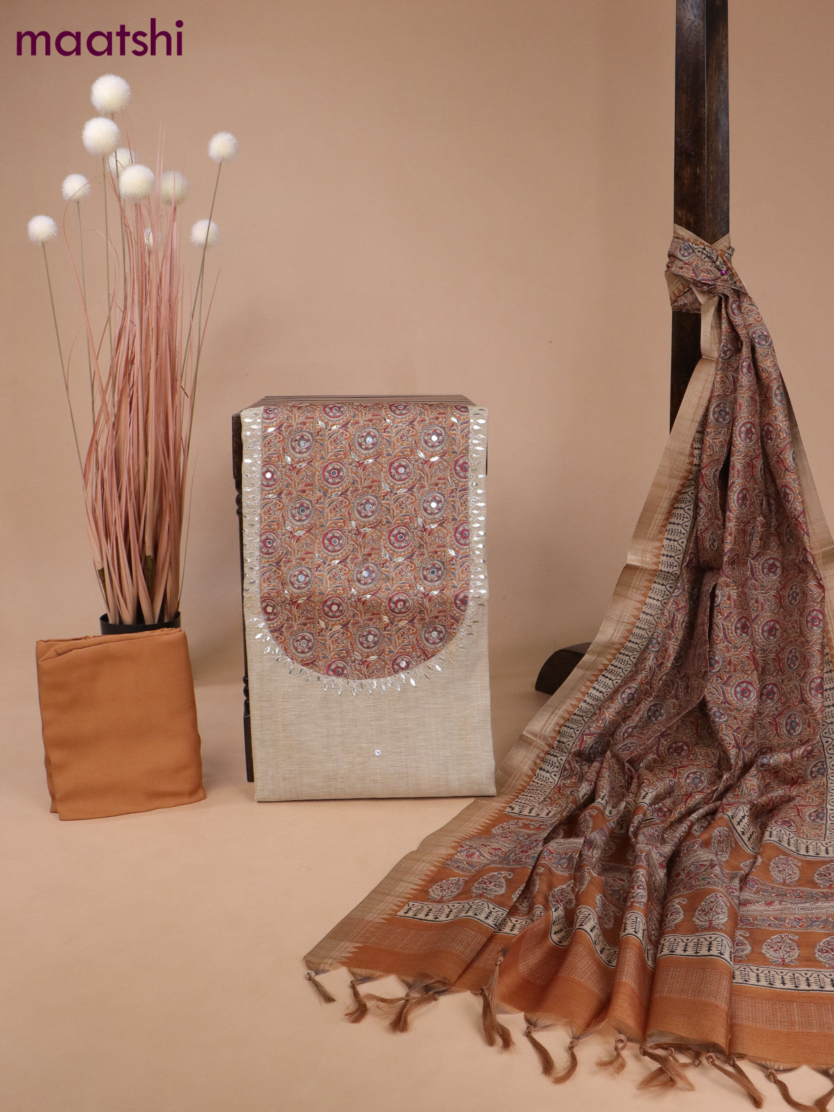 Linen silk dress material beige and rust shade with kalamkari patch work neck pattern & mirror work and bottom & printed dupatta