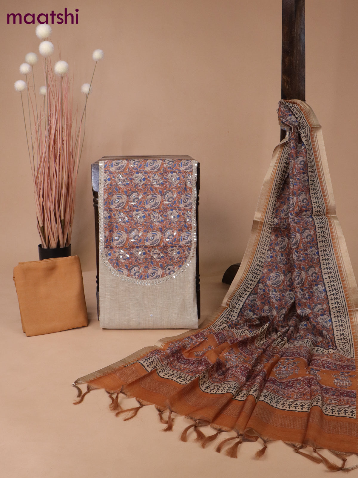 Linen silk dress material beige and rust shade with kalamkari patch work neck pattern & mirror work and bottom & printed dupatta
