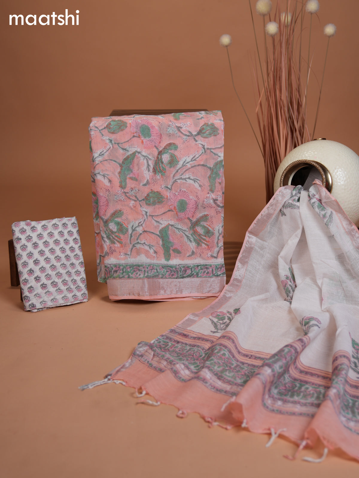 Linen cotton dress material mild peach orange and off white with allover prints and bottom & dupatta