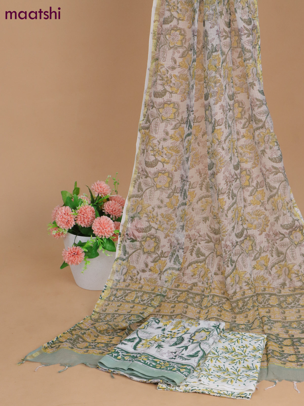 Mulmul cotton dress material off white and green with allover kalamkari prints and bottom & kota printed dupatta
