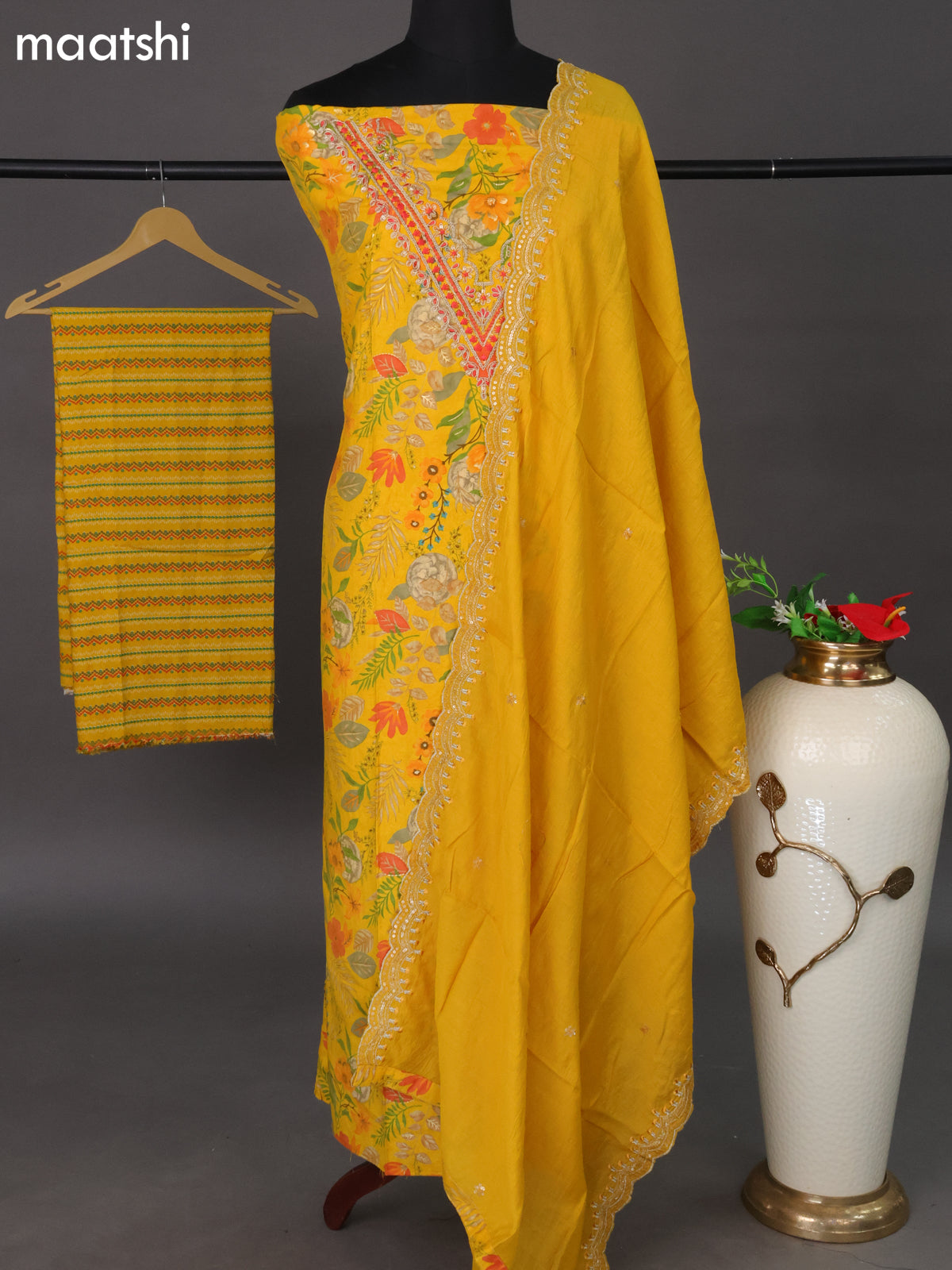 Modal dress material yellow with allover prints & embroidery work neck pattern and bottom & dupatta