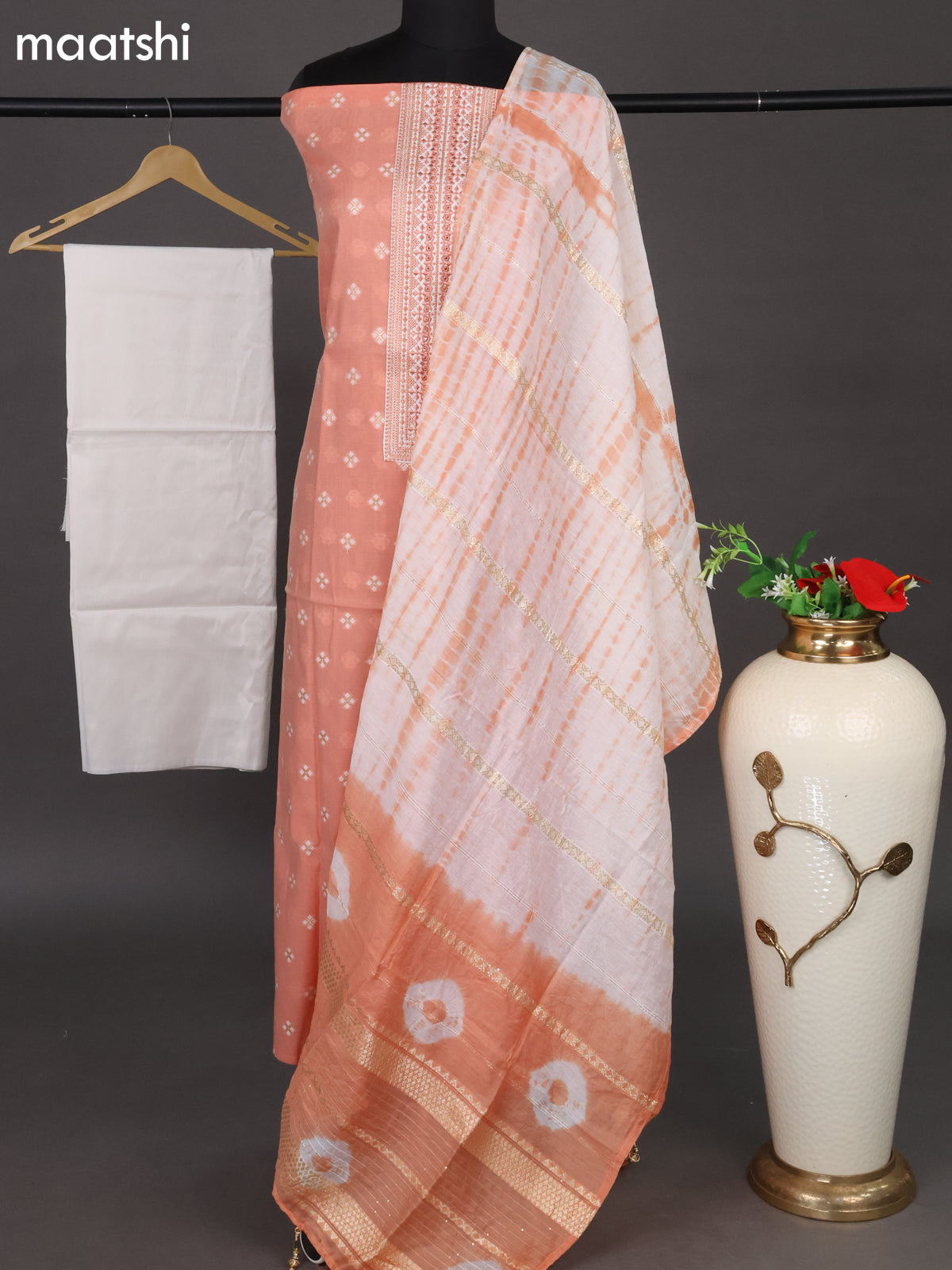Chanderi dress material peach orange and off white with woven buttas & embroidery work neck pattern and bottom & sequin work dupatta