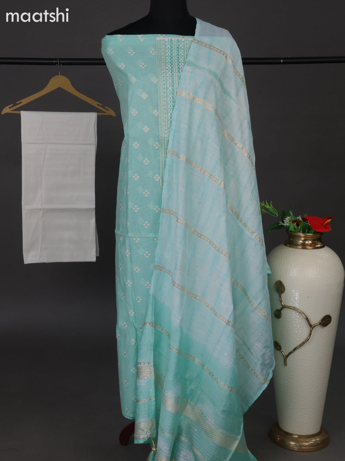 Chanderi dress material teal blue shade and off white with woven buttas & embroidery work neck pattern and bottom & sequin work dupatta