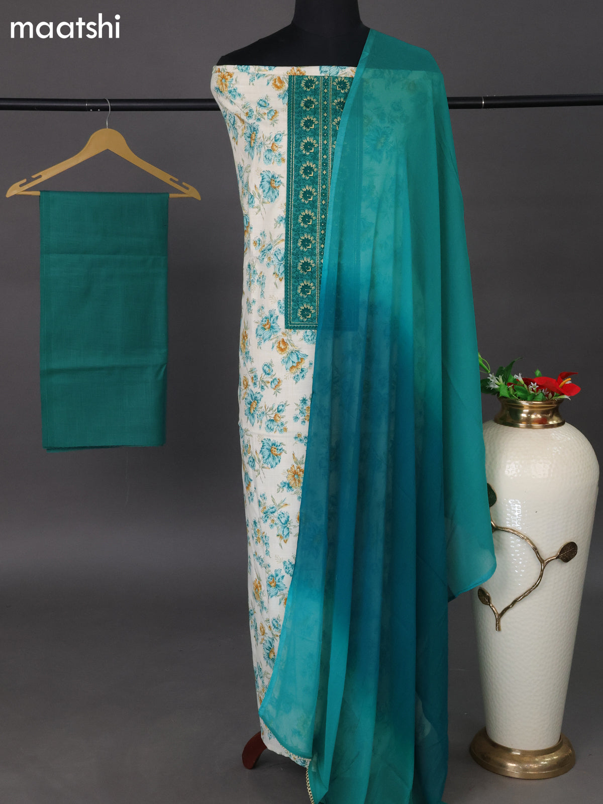 Cotton dress material off white and teal green with floral prints & embroidery work neck pattern and bottom & dupatta