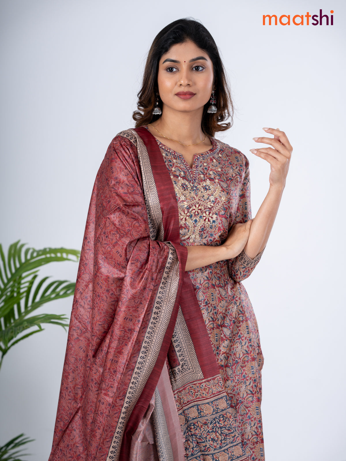 Modal salwar suit maroon with allover kalamkari prints & zardosi work neck pattern and straight cut pant & dupatta