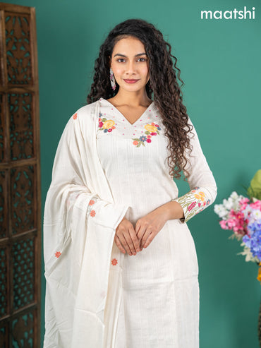 Cotton salwar suit off white with self emboss buttas & floral embroidery work v neck pattern and straight cut pant & dupatta