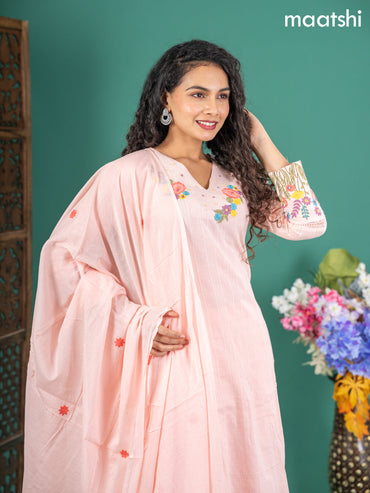 Cotton salwar suit peach shade with self emboss buttas & floral embroidery work v neck pattern and straight cut pant & dupatta