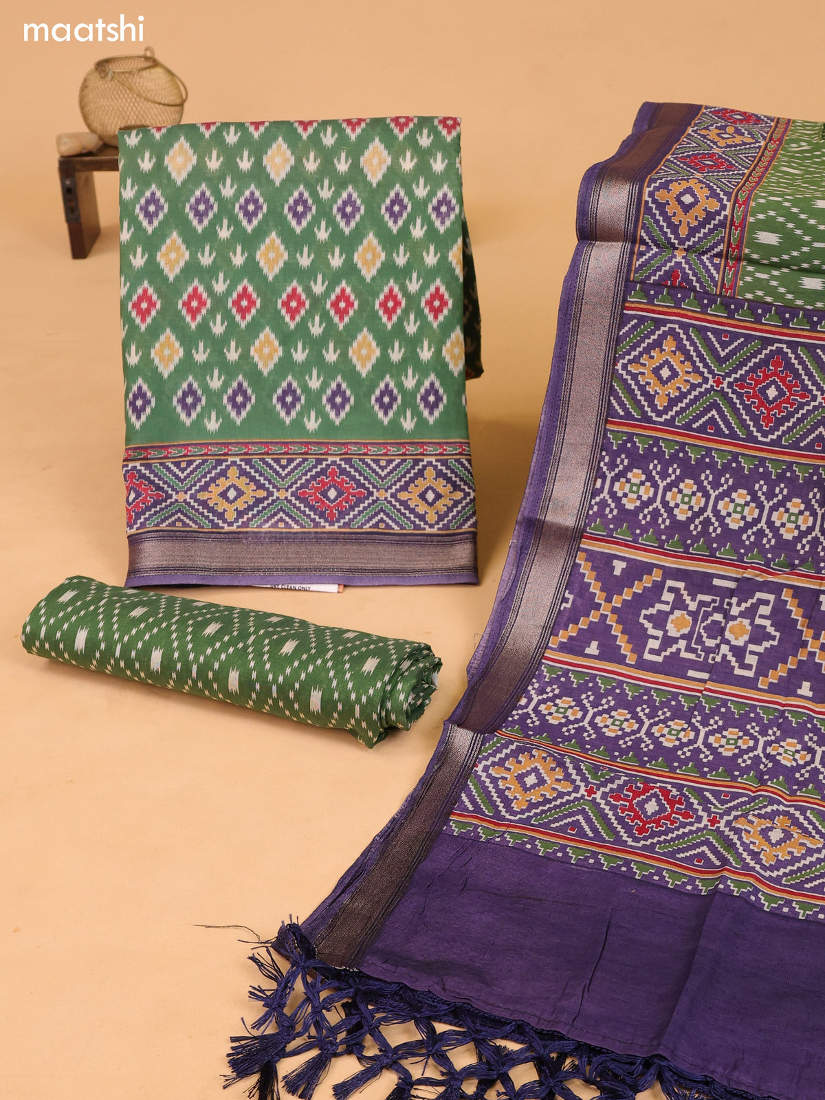 Green and Pastel Purple Art Silk Dress Material With Allover Ikat Weaves and Bottom & Dupatta