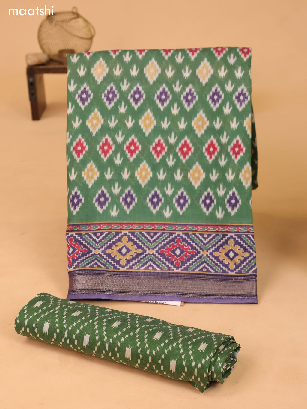 Green and Pastel Purple Art Silk Dress Material With Allover Ikat Weaves and Bottom & Dupatta