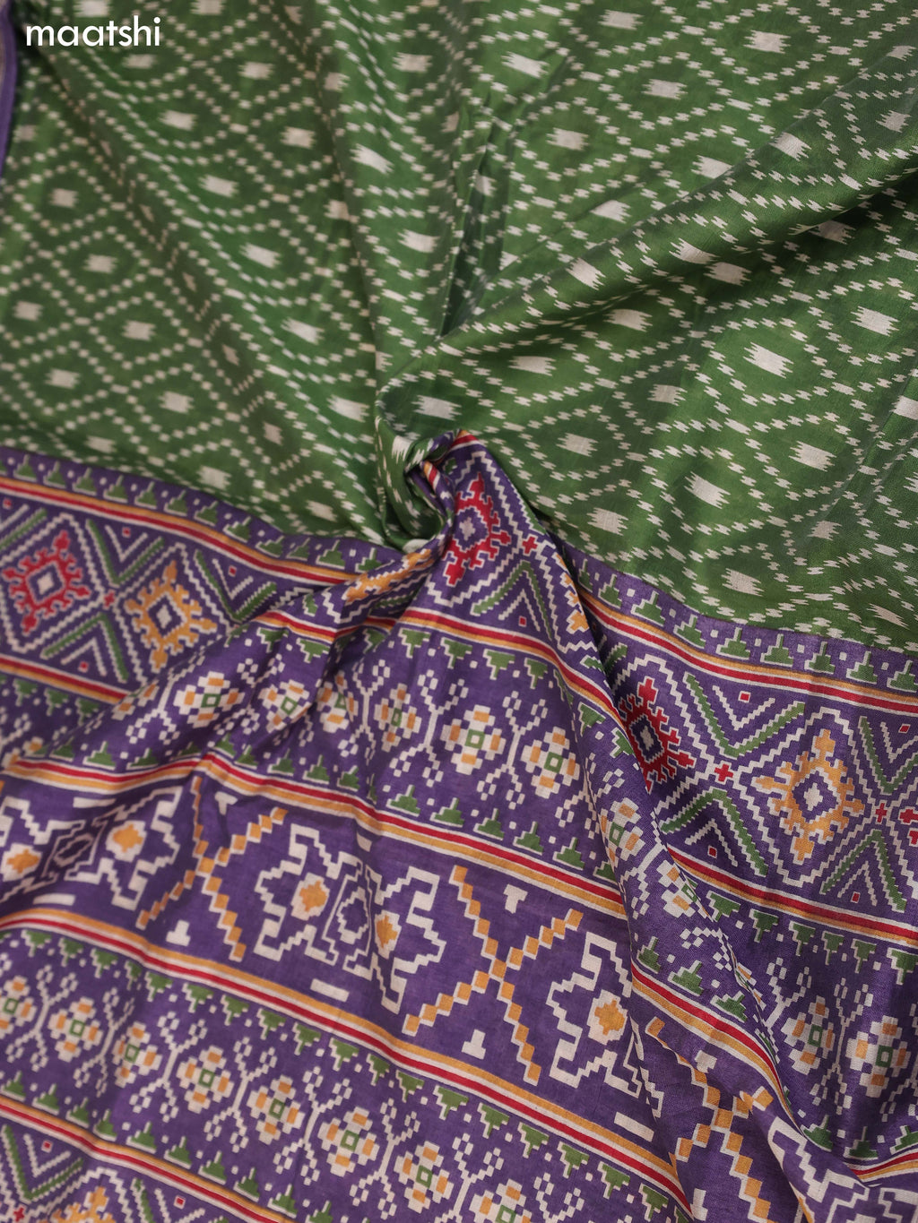 Green and Pastel Purple Art Silk Dress Material With Allover Ikat Weaves and Bottom & Dupatta