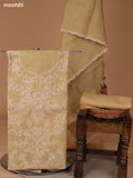 Pastel Yellow and Off White Tissue Linen Dress Material With Embroidery Work Neck Pattern and Bottom & Dupatta
