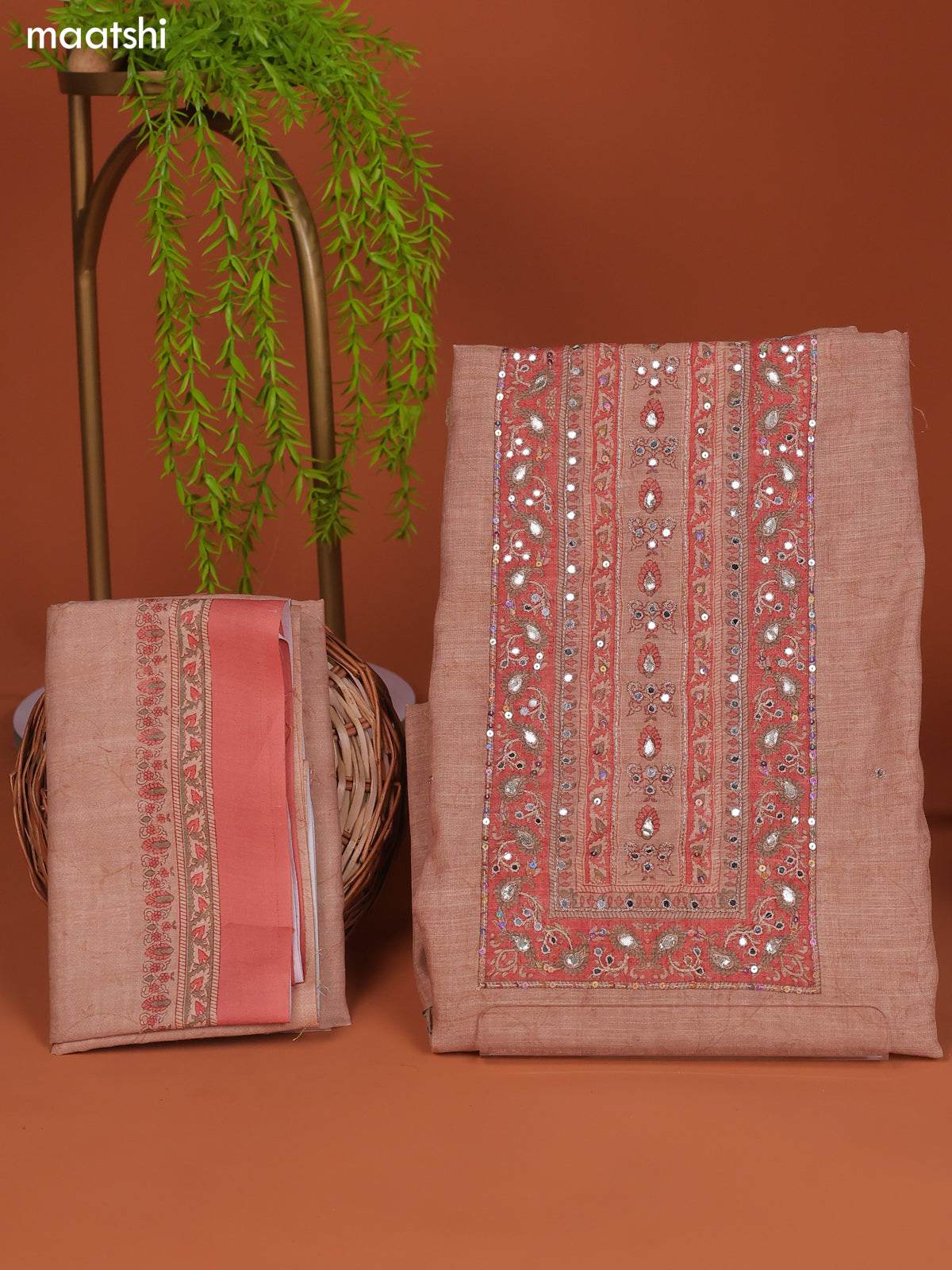 Mild Peach Linen Cotton Dress Material With Prints & Embroidery Work Neck Pattern