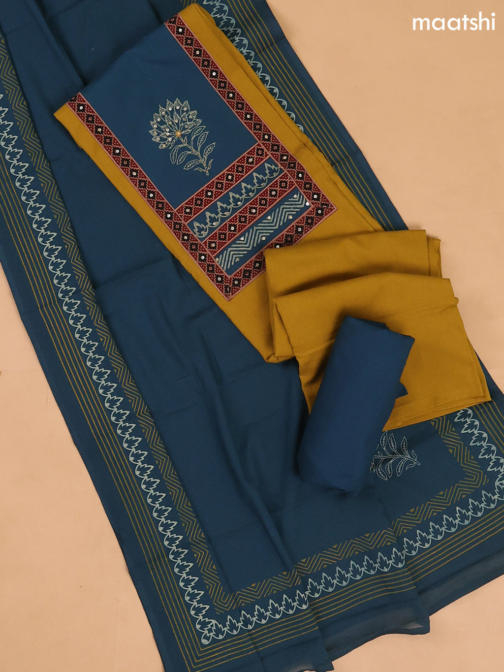 Musted Yellow and Peacock Blue Cotton Dress Materials With Patch Work Neck Pattern