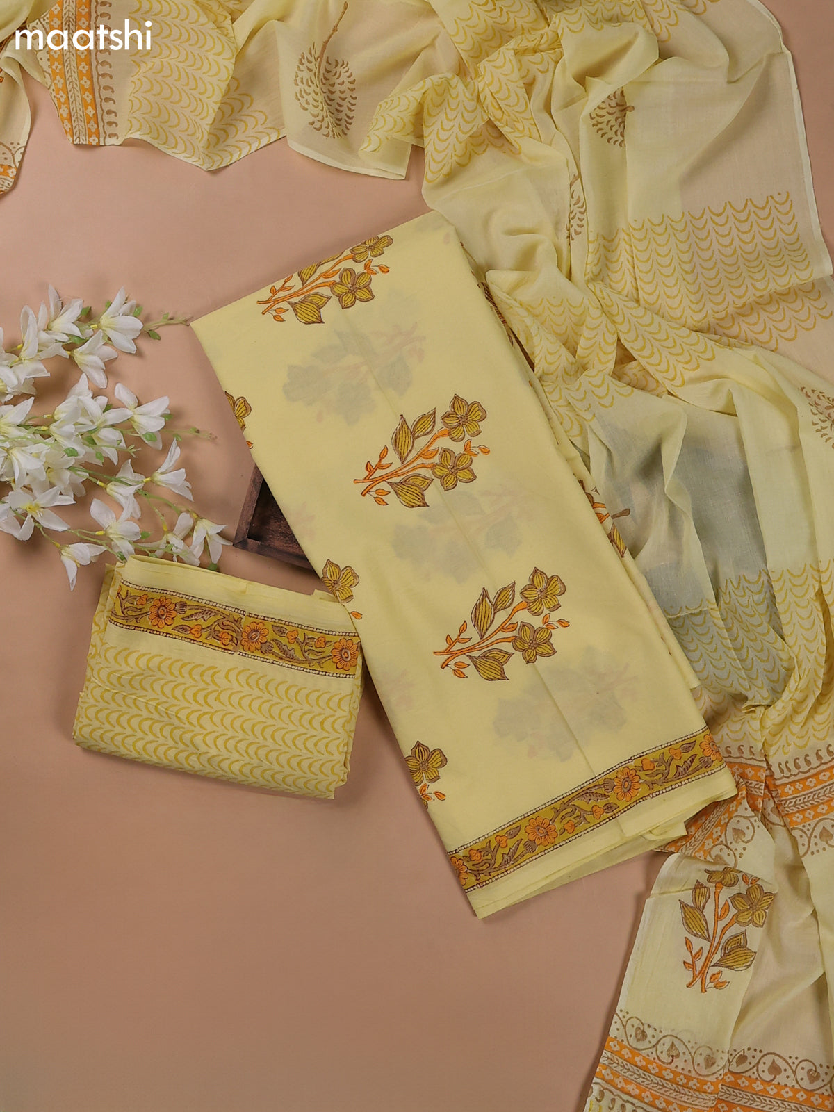 Pale Yellow Mulmul Cotton Dress Materials With Floral Butta Weaves