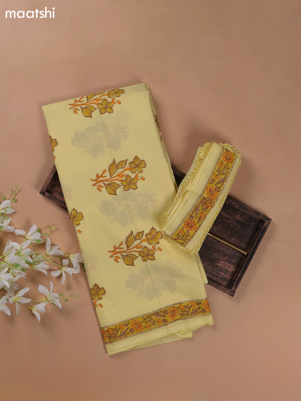 Pale Yellow Mulmul Cotton Dress Materials With Floral Butta Weaves