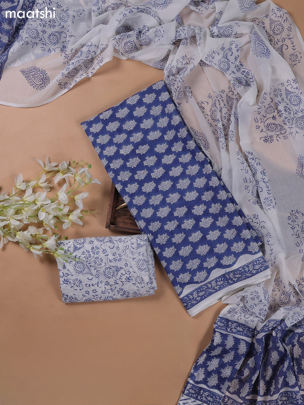 Blue and Off White Mulmul Cotton Dress Materials With All Over Floral Butta Weaves