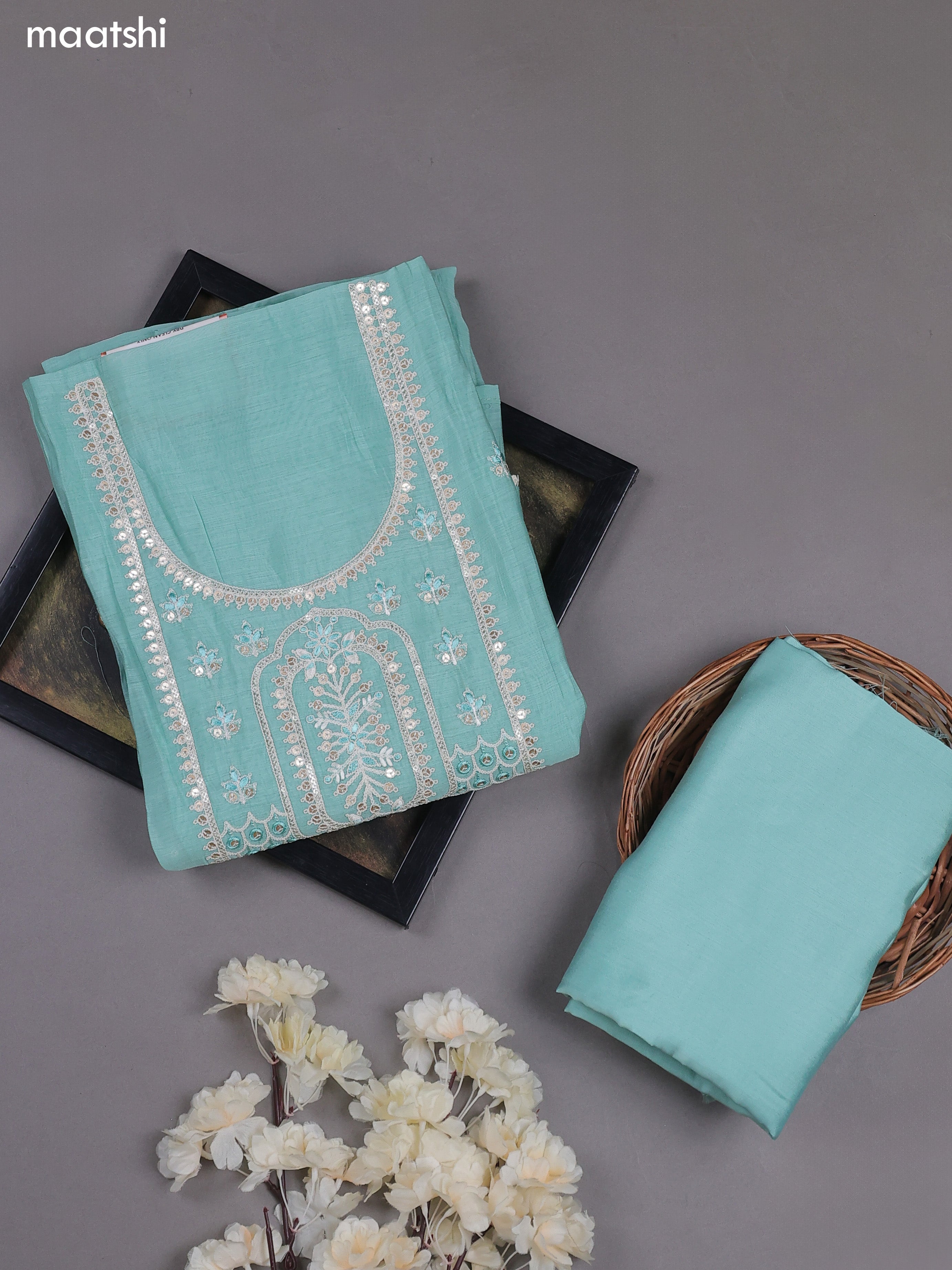 Teal Blue Mul Chanderi Dress Materials With Floral Embroidery Work Neck Pattern