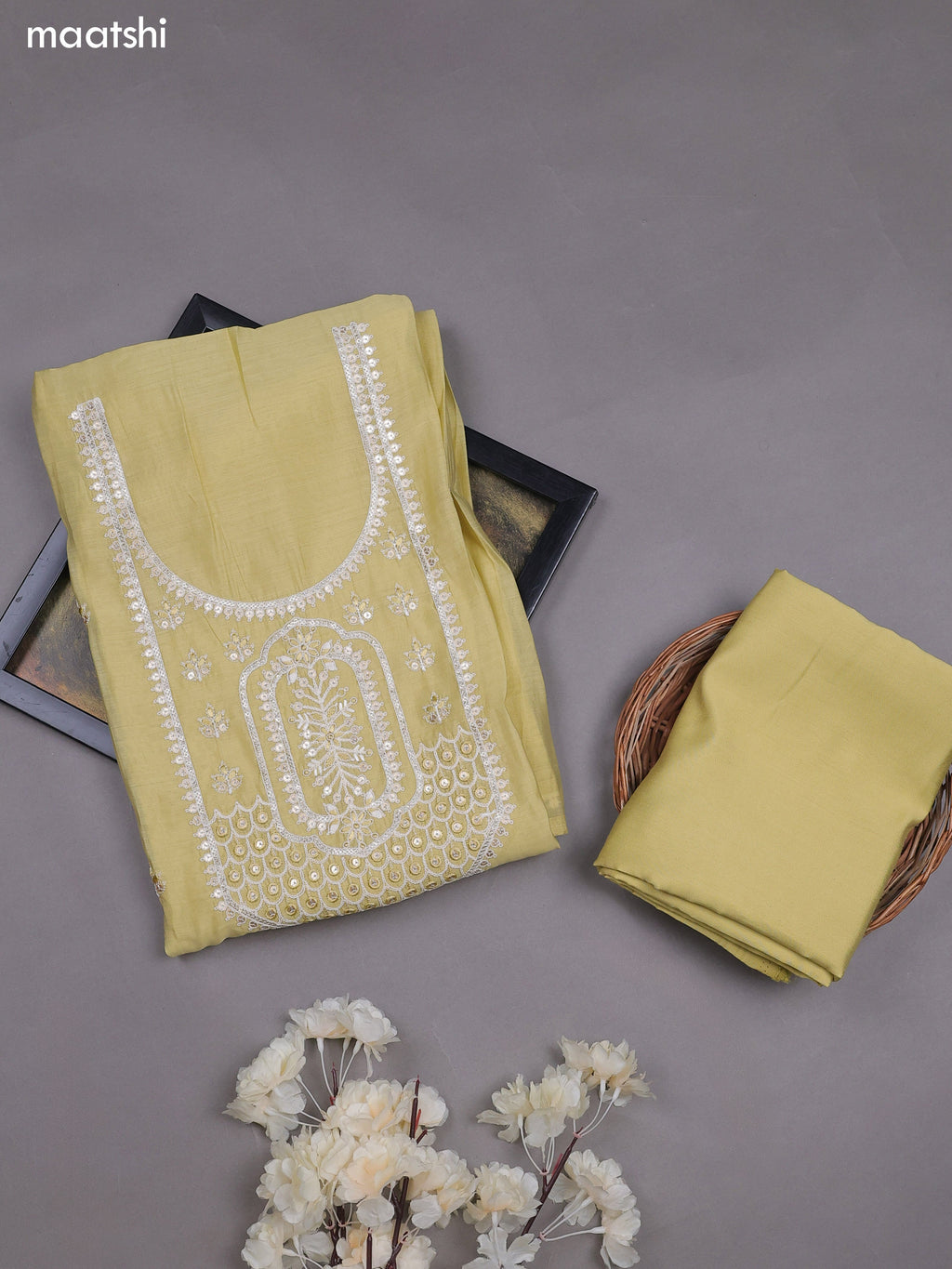 Pale Yellow Mul Chanderi Dress Materials With Floral Embroidery Work Neck Pattern