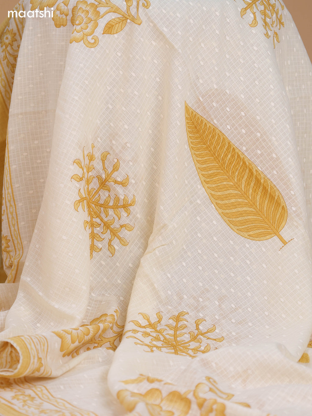 Off White and Mustard Cotton Dress Material With Allover Floral Prints and Lace Work Neck Pattern and Bottom & Dupatta