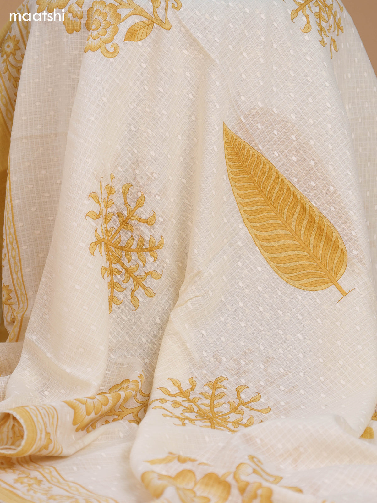 Off White and Mustard Cotton Dress Material With Allover Floral Prints and Lace Work Neck Pattern and Bottom & Dupatta