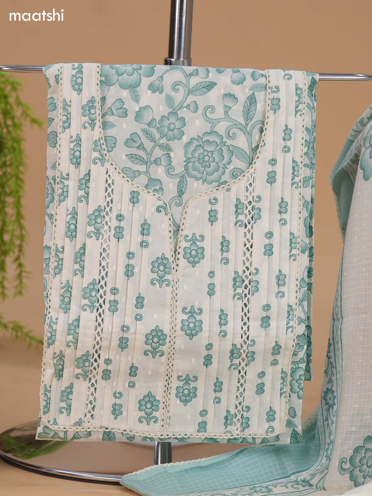 Off White and Teal Green Cotton Dress Material With Allover Floral Prints and Lace Work Neck Pattern and Bottom & Dupatta