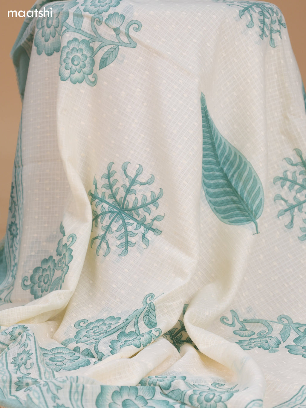 Off White and Teal Green Cotton Dress Material With Allover Floral Prints and Lace Work Neck Pattern and Bottom & Dupatta